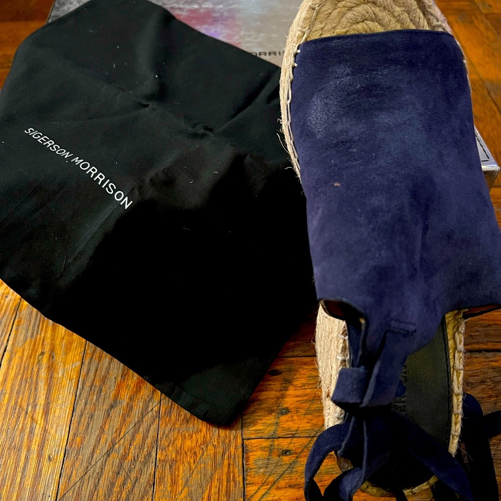 Brand New. Never used. Suede Navy Blue Sandals.   Size 6.5.   Beautiful!